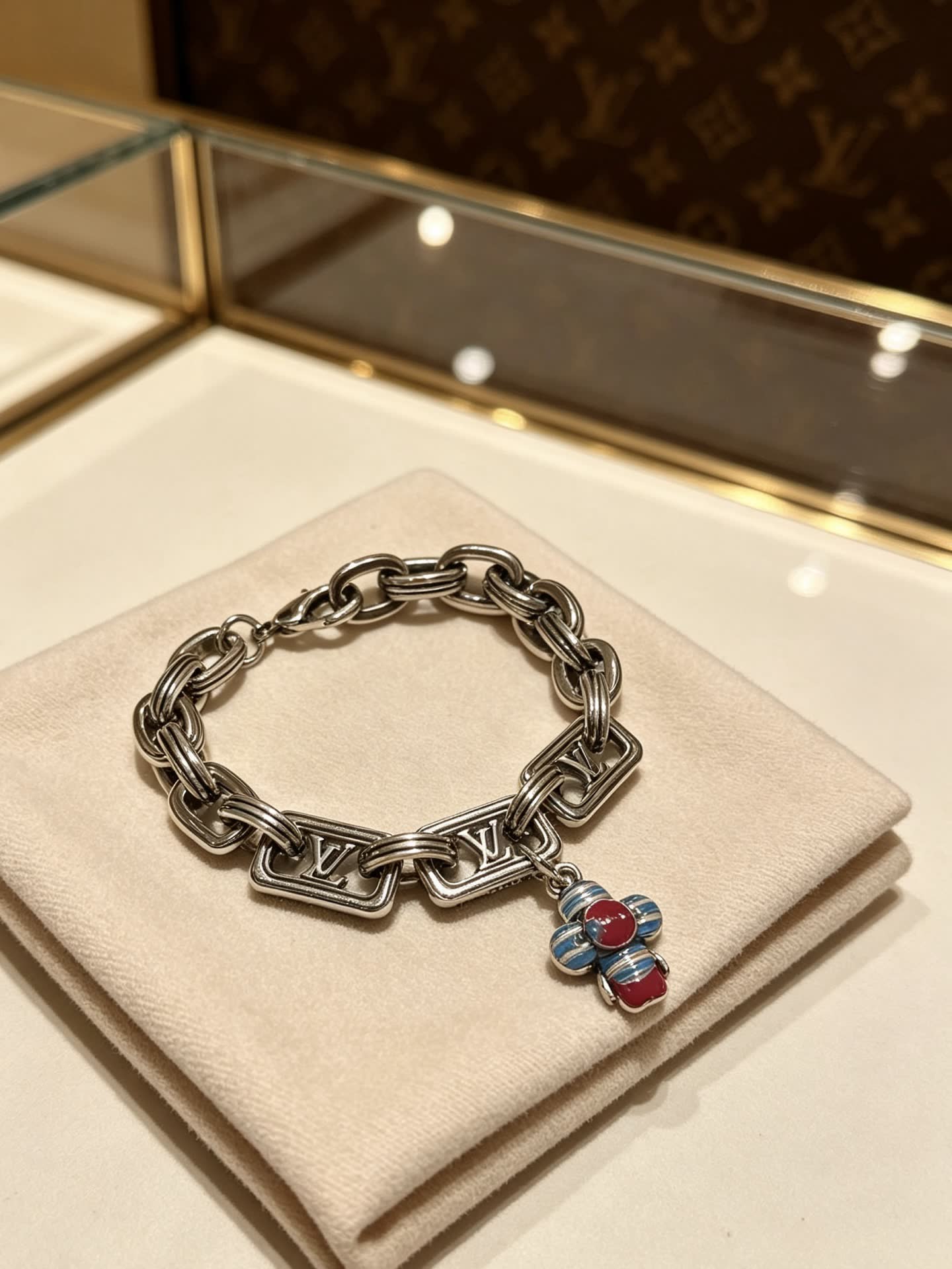 Louis Vuitton Silver Tone Bracelet with Monogram Charm